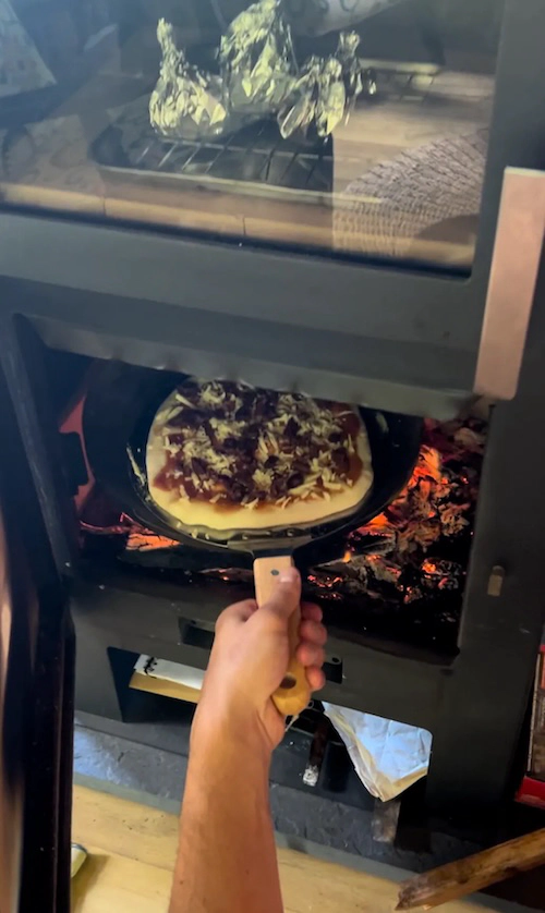 Baking pizza in the chimney room.
